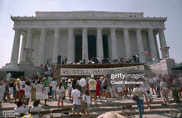 Washington: Part of the crowd of $55,000 watch Jesse Jackson address the 25th anniversary of the March on Washington at the Lincoln Memorial.