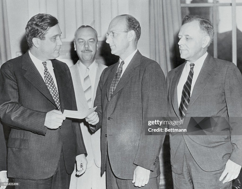 Wendell Willkie accepting Check from David E. Lilienthal