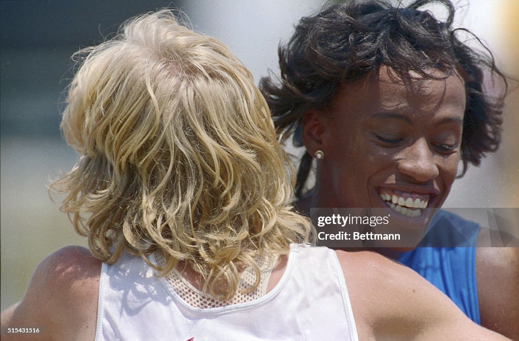 Heptathlete Jackie Joyner-Kersee Hugging Terri Turner