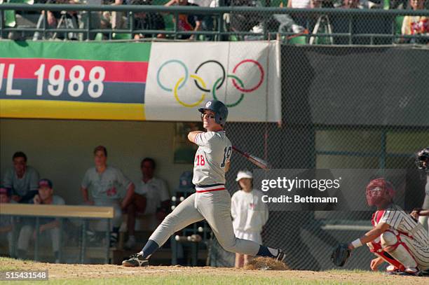 Olympics: Seoul: USA first baseman Tino Martinez of the University of Tampa watches as his second home run of the game clears the left field wall in...