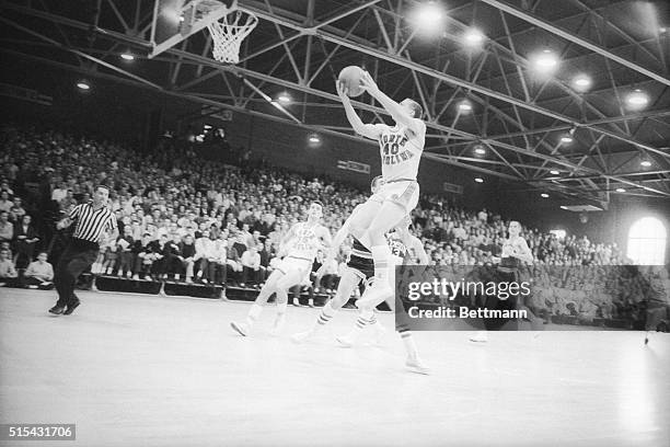 S All-America candidate, guard Tommy Kearns, , goes in for lay-up during early action in Clemson-North Carolina game here December 7, 1958. Kearns...