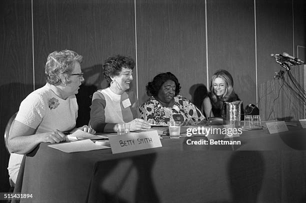 Some of the keynote speakers at the opening of the National Women's Political Caucus, enjoy a light moment. Left to right are: Betty Smith, former...