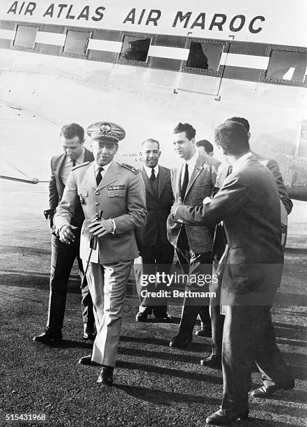 Rabat, Morocco- Prince Moulay Hassan , son of the Sultan of Morocco, turns away after talking to Ahmed Ben Bella, Mohammed Khider and Hussein...