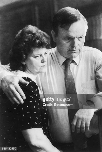 Parents of murdered college student Mark Kilroy, Helen and Jim Kilroy comfort each other here on April 2, 1989 at their home in Santa Fe, Texas after...