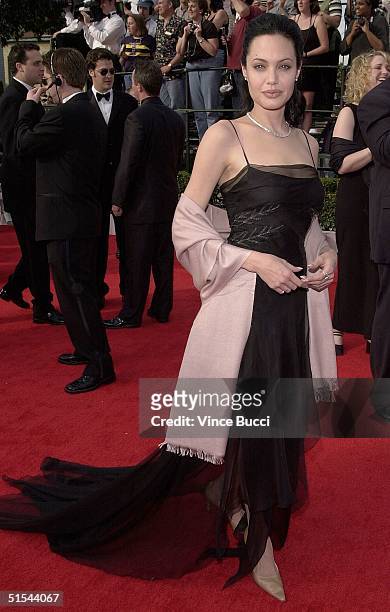 Actress Angelina Jolie arrives at the Sixth Annual Screen Actors Guild Awards in Los Angeles 12 March 2000. Jolie won the award for best motion...