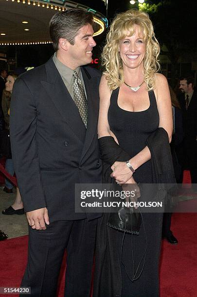 Erin Brockovich arrives at the premiere of the new film "Erin Brockovich," which is based on the true story of her legal fight, with her husband Eric...