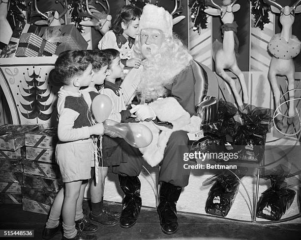 New York- The earliest Santa of them all opens up shop at Abraham and Strauss' toyland in Brooklyn as a special toyland preview is given for Brooklyn...