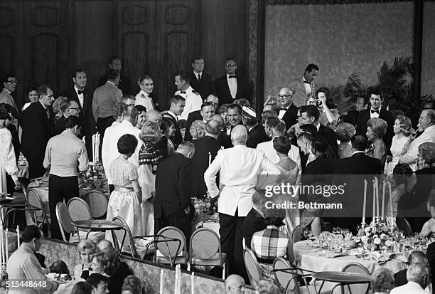 Los Angeles, CA- President Nixon and Apollo 11 astronaut Neil Armstrong mingle with the guests at the dinner honoring the Apollo 11 astronauts at the...