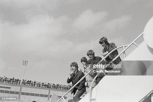 New York, NY- Beatles fans are out in force to see their idols leave for home from Kennedy Airport on Sept.21st. Great Britain's latest contributions...