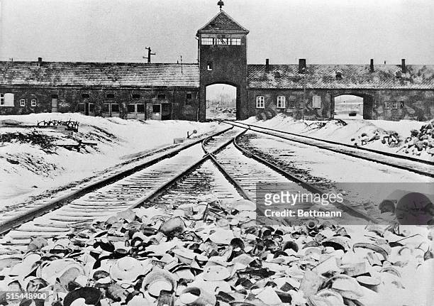 Entrance to the German concentration camp of Auschwitz-Birkenau in Poland. Undated B/W photograph.