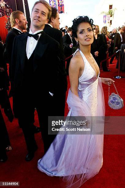 Actress Salma Hayek arrives with actor Ed Nortonto the Shrine Auditorium in Los Angeles for the 72nd Annual Academy Awards 26 March 2000. AFP...