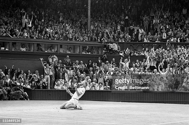 Wimbledon, England- The Men's Single's final- Bjorn Borg sinks to knees after making the winning shot in the final set. He defeated John McEnroe 7-5,...
