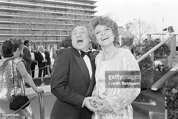 Los Angeles, CA- Anne Bancroft and her husband Mel Brooks ham it up for photographers, as they arrive for Academy Awards. Bancroft is the nominee for...