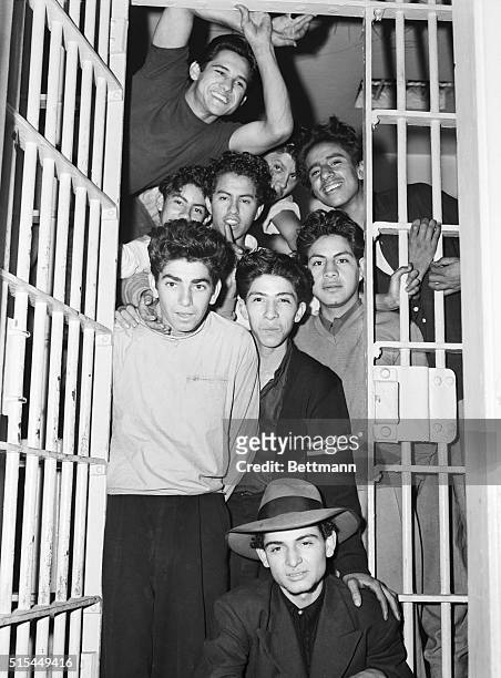 Los Angeles, California- Boisterous lads grin from a cell in the Los Angeles jail, as the institution does land office business as a result of the...