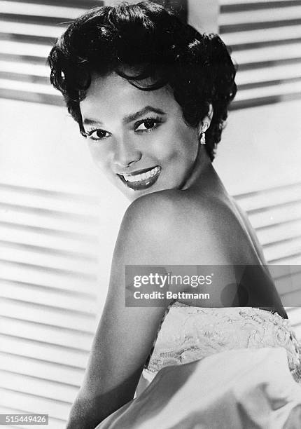 Los Angeles, CA- Actress-singer Dorothy Dandridge announced her engagement to night club owner Jack Denison and, before sailing from New York for...