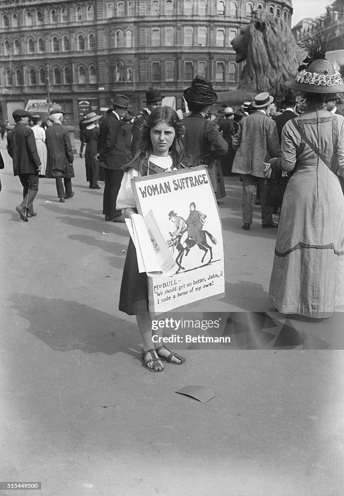 Young Suffragist Wearing Placard