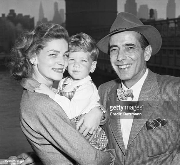 New York, NY- Actor Humphrey Bogart and his wife, actress Lauren Bacall, are just plain folks to their two-and-1/2-year-old son Stephen. They are...