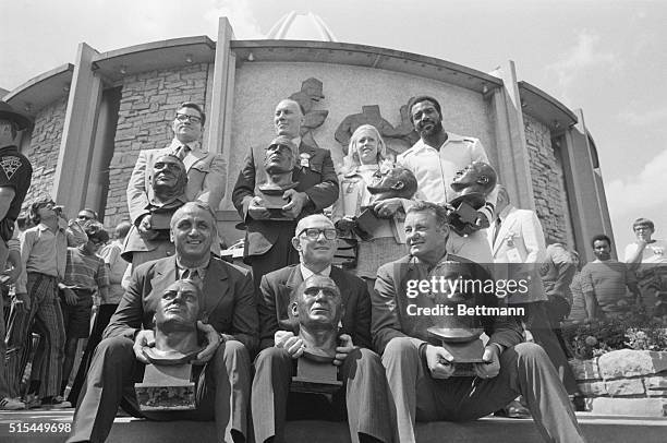 Canton, OH- Busts of seven new members of the Professional Football Hall of Fame are displayed in front of the hall after enshrinement ceremonies....