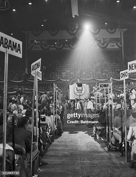Chicago, Illinois- Convention Hall: with a brilliant light shining down on him, General Douglas MacArthur, , delivers the keynote speech of the 1952...