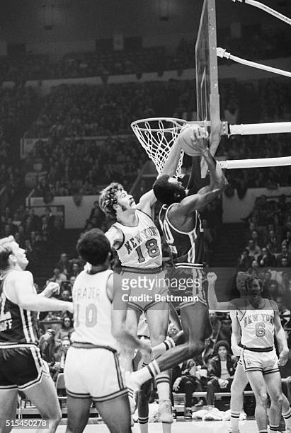New York, NY- Knicks' Phil Jackson prevents Royals' Johnny Green from scoring two points during a game at Madison Square Garden. Looking on at left...