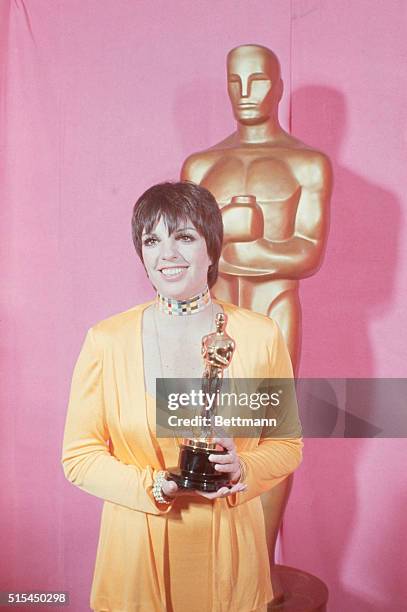 Hollywood, CA- Liza Minnelli holds Oscar she won as "Best Actress of 1972" for "Cabaret" at the Academy Awards Ceremony here.