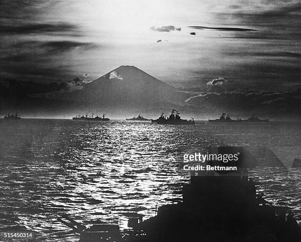 Japan- Mount Fujiyama fills the horizon and provides a fitting backdrop for the Allied naval might gathering Tokyo Bay as the sun set on Japan's...