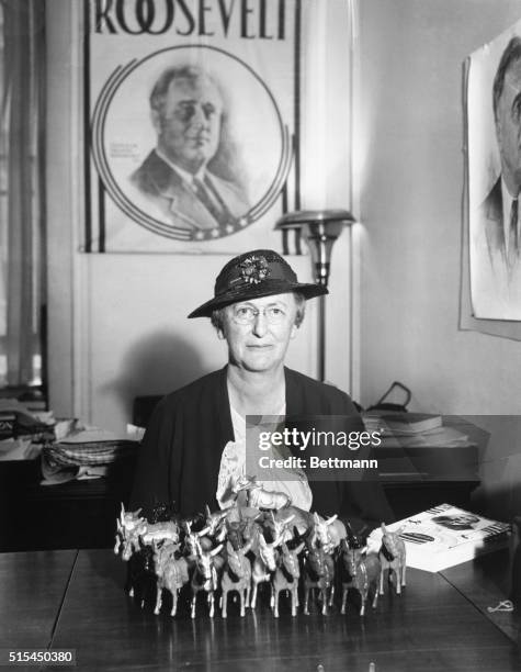 Mary L. Dewson, chairman of the women's division of the Democratic National Committee, is pictured at her desk in the newly-opened campaign...