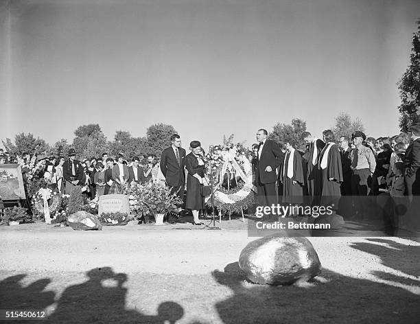 Fairmount, Indiana- James Dean's aunt, Mrs. Marcus Winslow, acknowledges a wreath from West Germany at Memorial Services for James Dean. Reverend Xen...