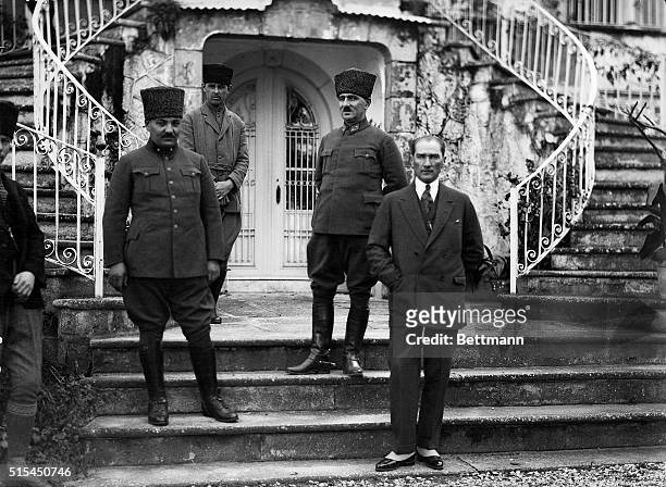 Turkey: Mustafa Kemal Atatürk , founder and President of the Turkish Republic, and officers on outdoor staircase, Smyrna .