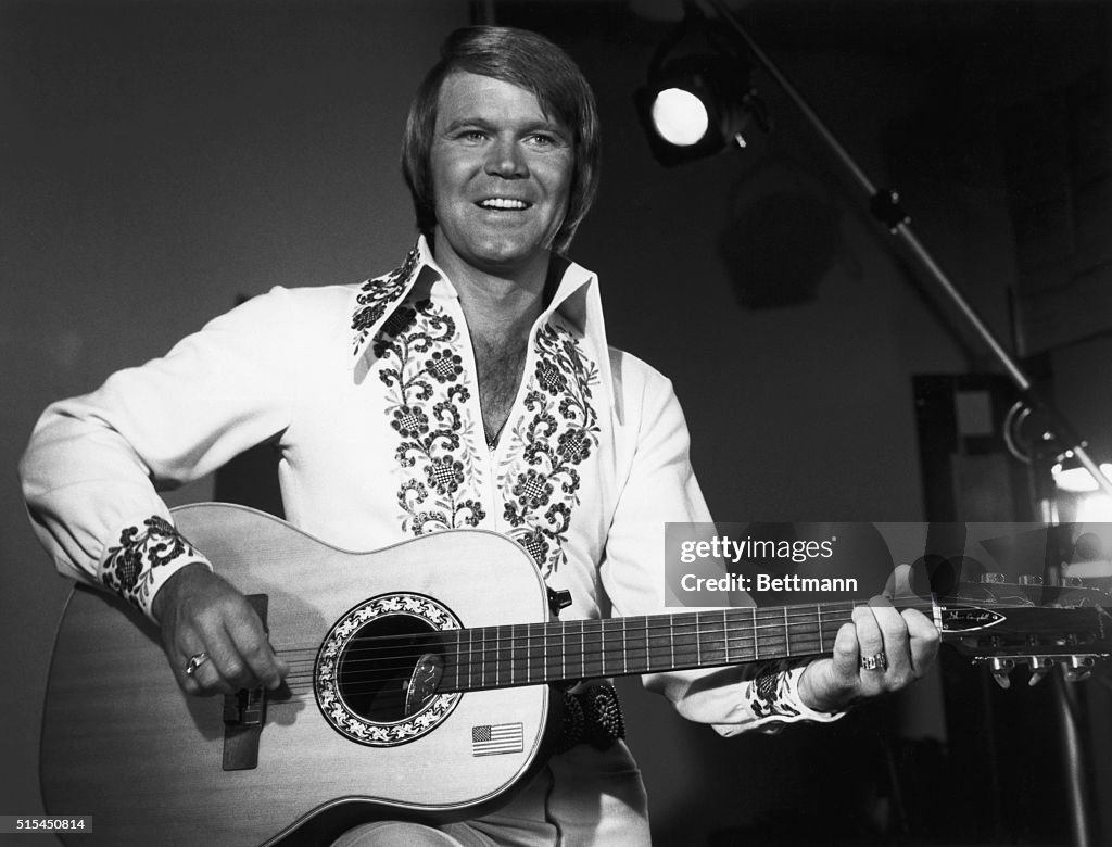 Singer Glen Campbell Playing Guitar
