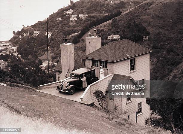Sausalito, California-: Ever hear of anyone who uses the attic of their house as a garage? The occupants of the Kate Gleason House at Sausalito, CA,...