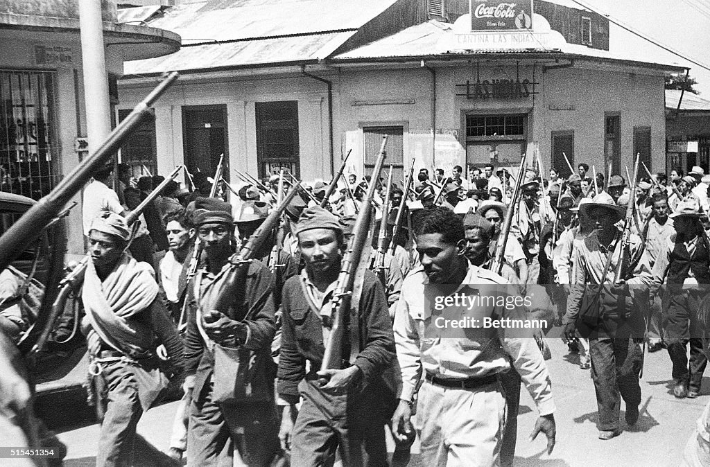 Costa Rican Soldiers March in Street