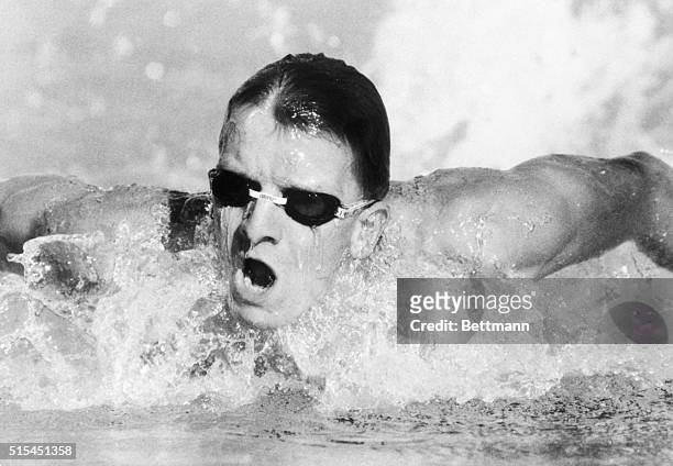 Los Angeles, California-ORIGINAL CAPTION READS: West Germany's Michael Gross practices his butterfly stroke during Olympic workout.