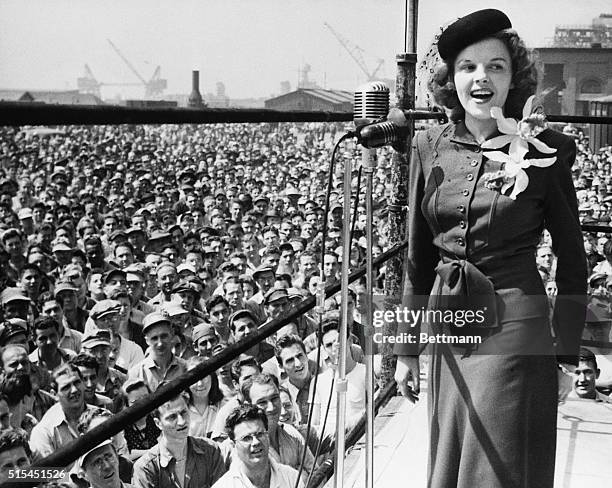 Philadelphia, PA- Judy Garland entertains civilian employees at the Philadelphia Navy Yard during a War Bond Drive.