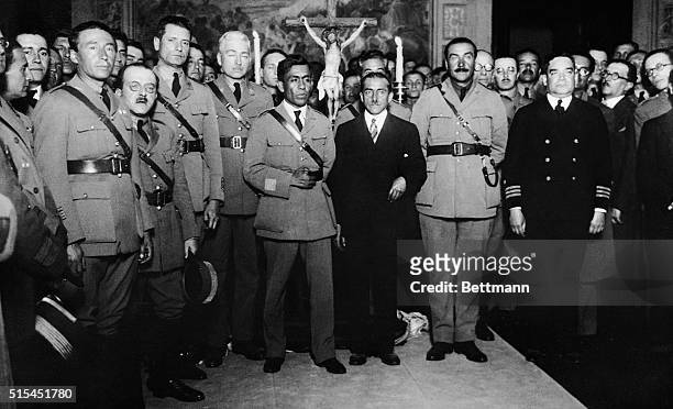 Lima, Peru- Colonel Luis M. Sanchez Cerro , surrounded by members of the Cabinet he formed following the ousting of President Augusto Leguia. Left to...