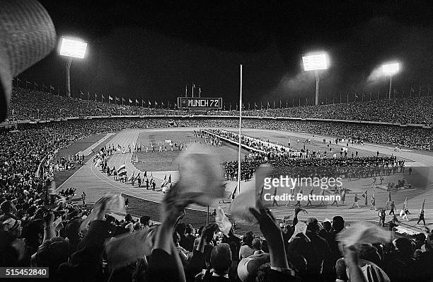 Mexico City, Mexico-Cannons roar, fireworks blaze and the massed athletes of the competing nations fill the Olympic Stadium infield as the XIX...