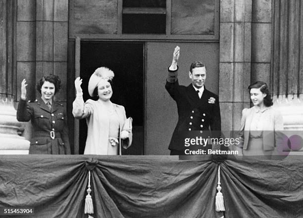 London, England- Britain's Royal Family gathers on the balcony of Buckingham Palace to observe V-E Day. L-r: Heir Presumptive Princess Elizabeth;...