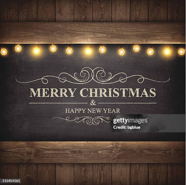 christmas lights on wooden boards and chalkboard - fancy gala stock illustrations