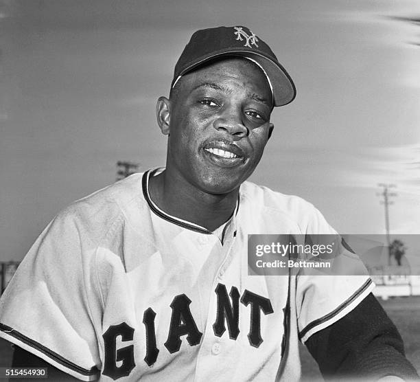 Willie Mays, Giants' centerfielder and rookie of the year in the National League at Giants' spring training, Phoenix, Arizona. Willis is waiting for...