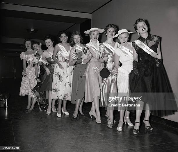 Miss Universe Contest. Putting their best foot forward are nine of the 15 international beauties who were honored at a get-together cocktail party...