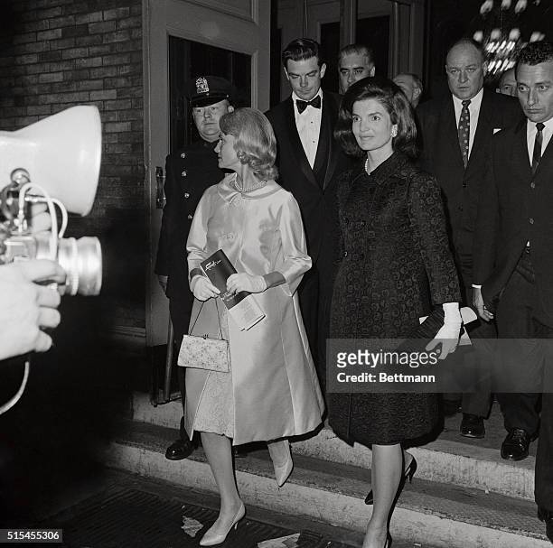 Mrs. John F. Kennedy is shown here as she leaves the Met after attending the Royal Ballet. At left is Mrs. Anthony Bliss, the wife of Chairman of the...