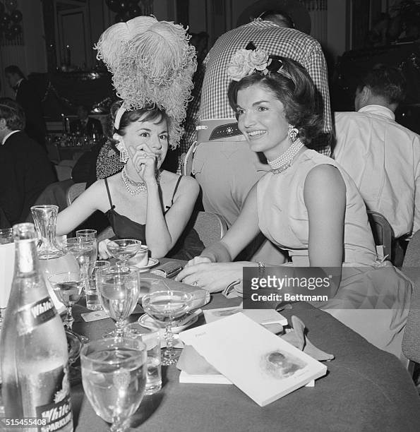 New York, New York: Jackie Kennedy talks to Baroness De La Bovillerie at the Wild West Ball at The Plaza.