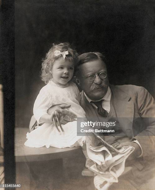 Lieutenant Colonel Theodore Roosevelt Jr. Posing with his first grandchild.