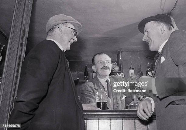 Marquis Grimaldi, , pretender to the throne of Monaco who runs a tavern called "The Chequers" Inn Ightham, chats with two of his villager customers,...