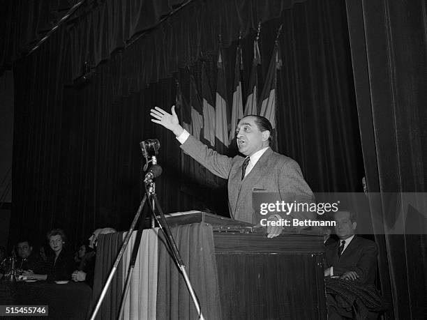 Former French Premier Pierre Mendes-France gestures during his opening speech of his campaign for re-election to the National Assembly in forthcoming...