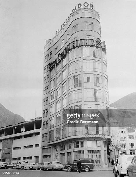 This curving, modernistic building at Bogota, Colombia, houses El Espectador, the country's leading opposition newspaper. The entire staff went on...