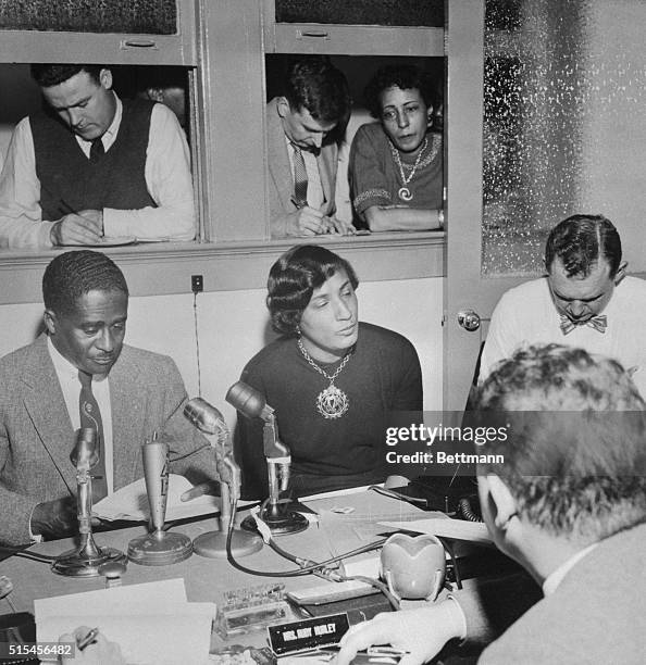 Negro attorney Arthur Shores, left, tells newsmen that he has entered two suits against the University of Alabama seeking admission with full student...