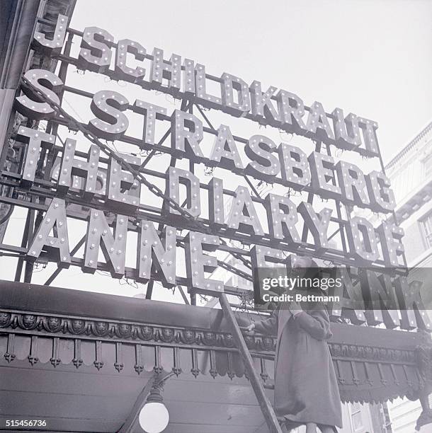 Actress Susan Strasberg mounts a ladder to see her name in lights over the Cort Theater after she was proclaimed the youngest star in Broadway...