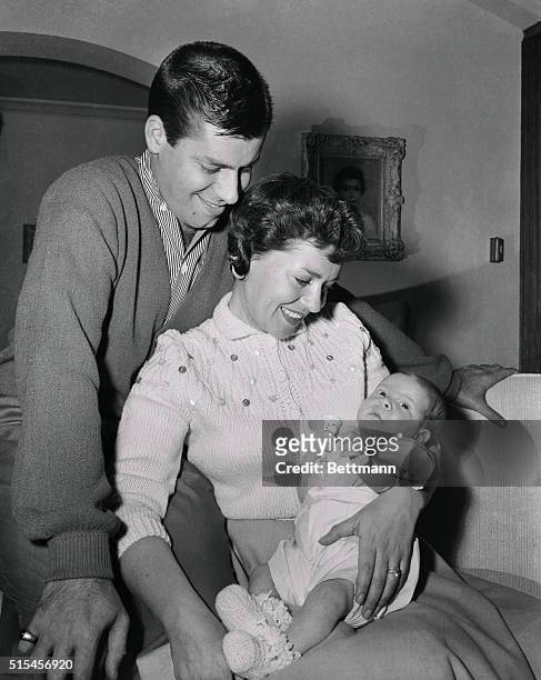 Comedian Jerry Lewis and his wife, Patti, pose with their baby son, Scott Anthony, for the infant's first photo in Hollywood April 12th. The little...