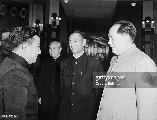 Mao Zedong, Chairman of the People's Republic of China, chats with Prince Norodom Sihanouk during the Cambodian Premier's state visit.